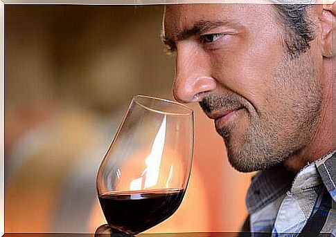 Man with a glass of red wine